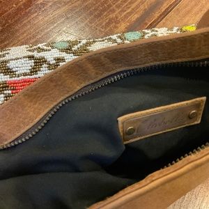 beautifully beaded & soft tanned leather Cleobella clutch